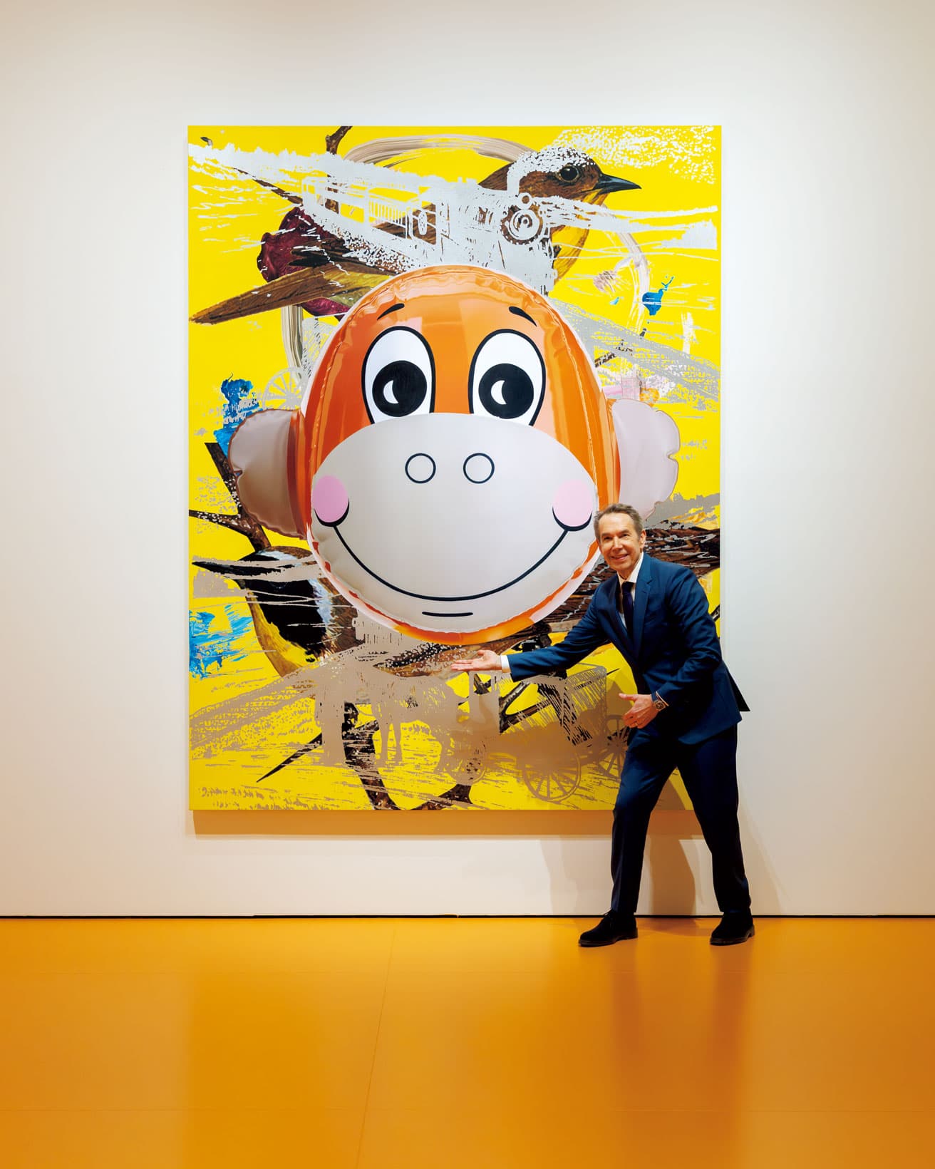 《モンキートレイン（鳥）（Monkey Train (Birds)）》（2007）。クーンズが2004年から手がける、巨大なキャンバス画や彫刻からなる「Hulk Elvis（ハルク・エルヴィス）」シリーズの一作。高さ2.7ｍを超える油彩画で、サルの顔のバルーンを、映り込みに至るまで緻密に描き出している。