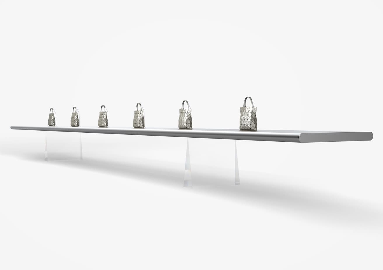 10mを超える巨大なアルミニウムのテーブルが浮遊する。© ISSEY MIYAKE INC. Store design: TOKUJIN YOSHIOKA + TYD